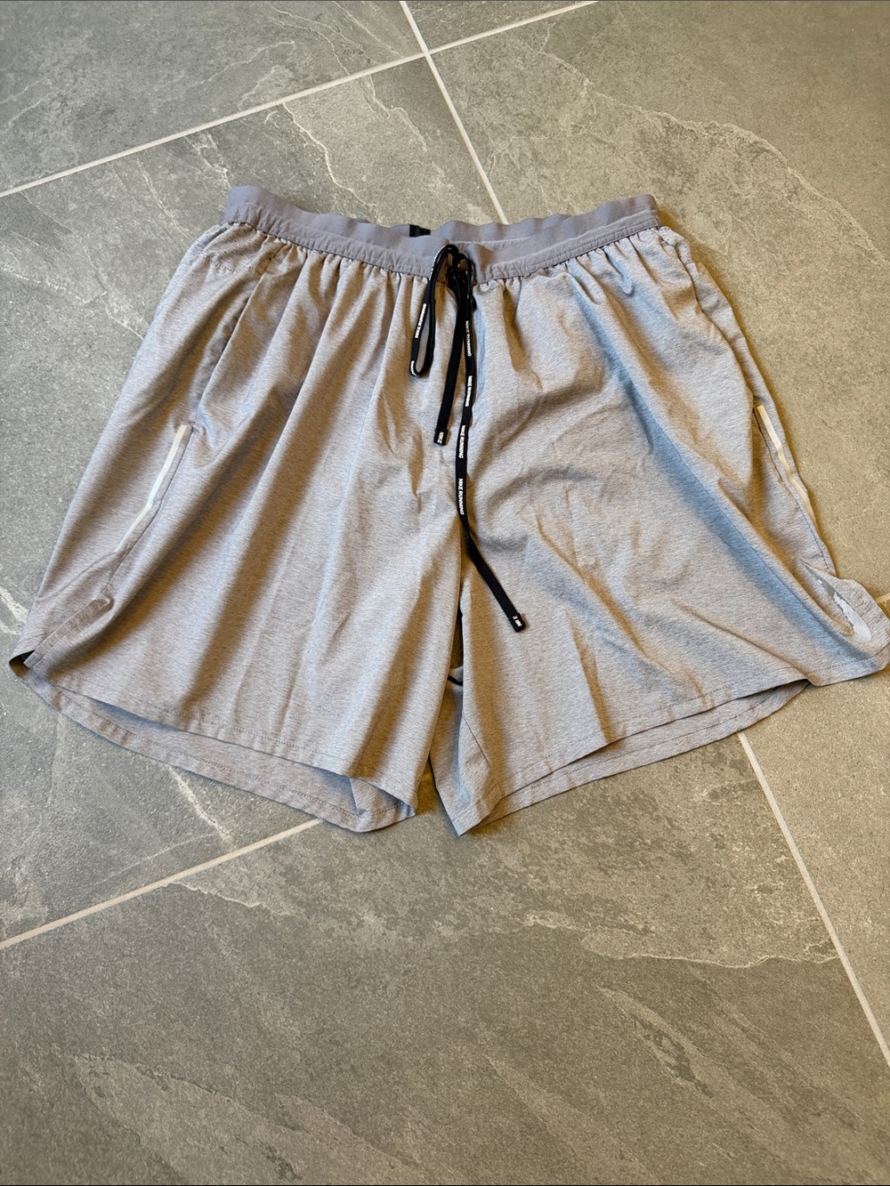 Nike Light Grey Athletic Shorts with Black Drawstring